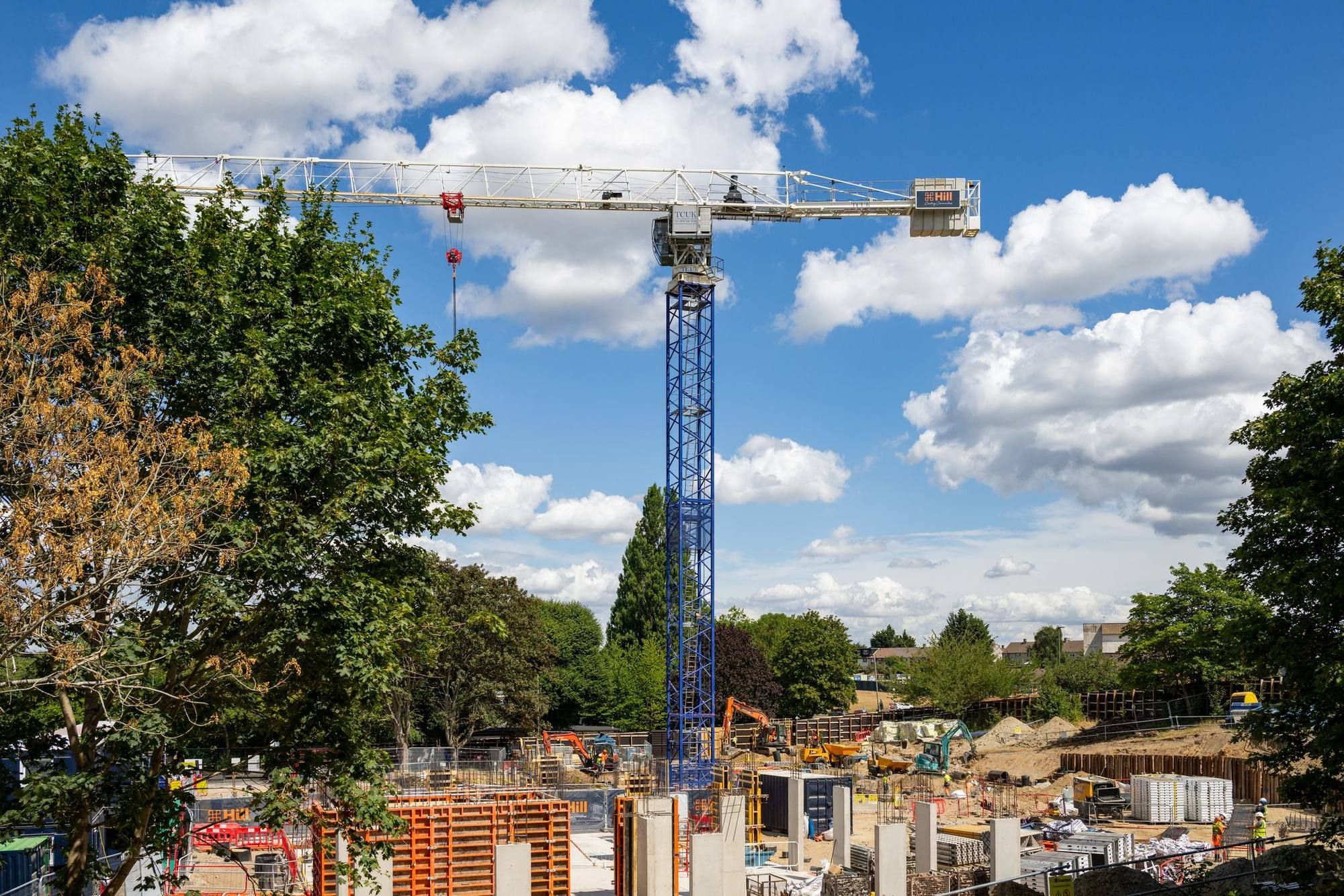 Tower crane over a residential construction site