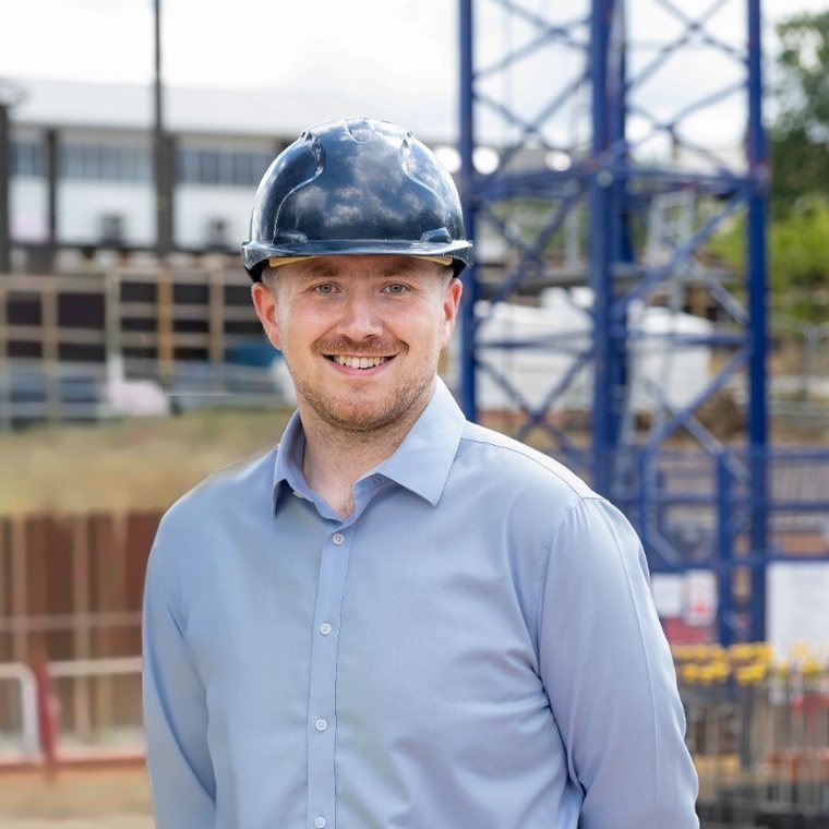 Max Graham, founder of Aedis Partners, on site in a hard hat